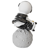 Skateboarding Astronaut Figurine