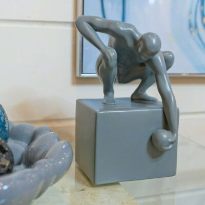 World in his Hand Ceramic Sculpture