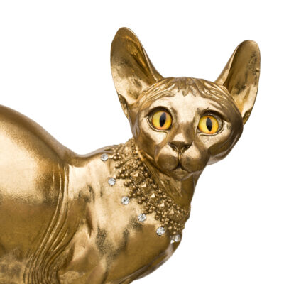 Golden sphynx cat statuette face
