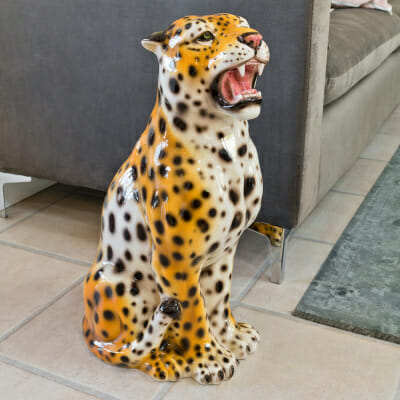 Porcelain Sitting Leopard Cub Statue in our Showroom