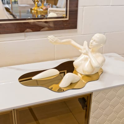 Liquid Embrace Cream Resin Sculpture in our Showroom